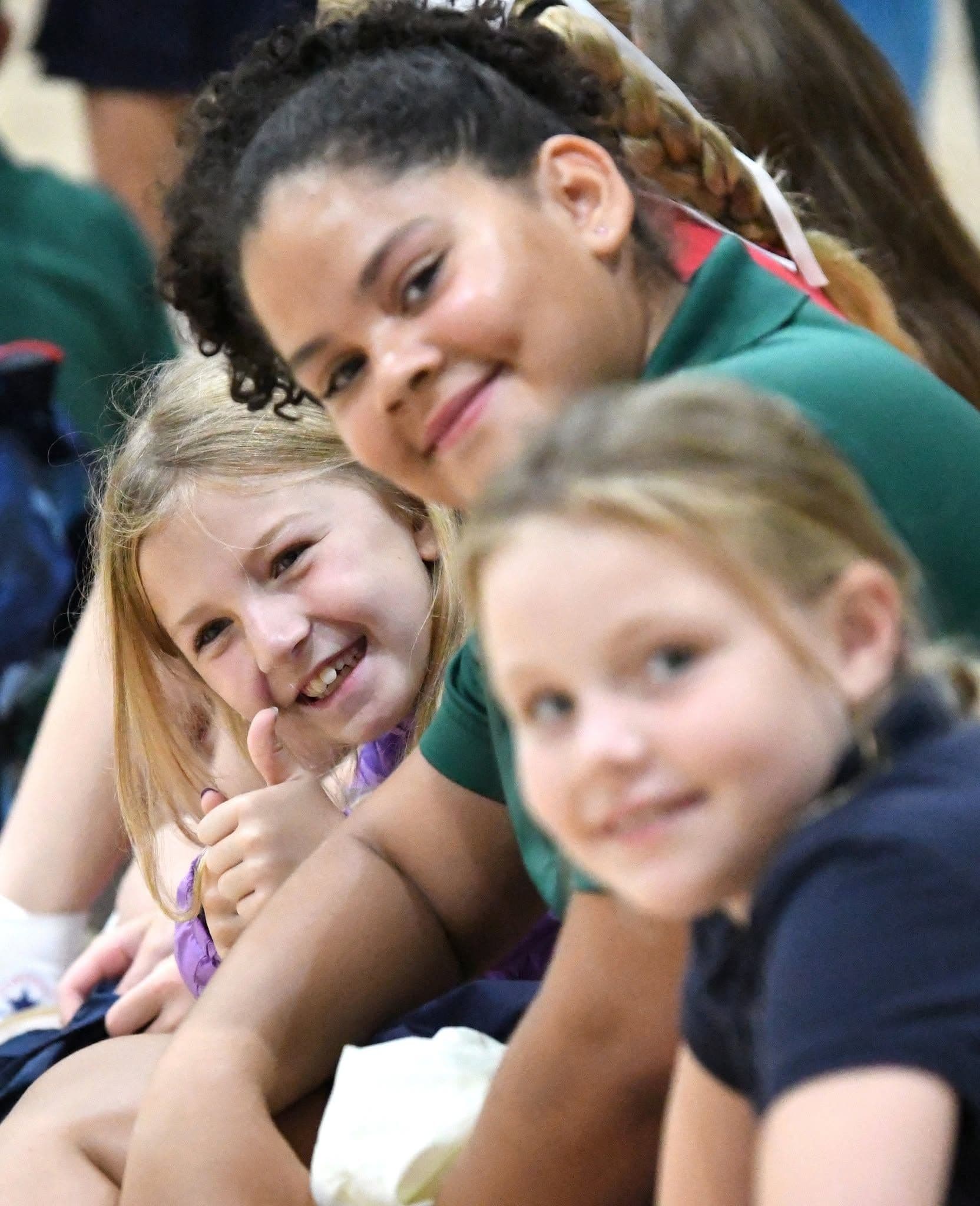 Happy students smile for the camera