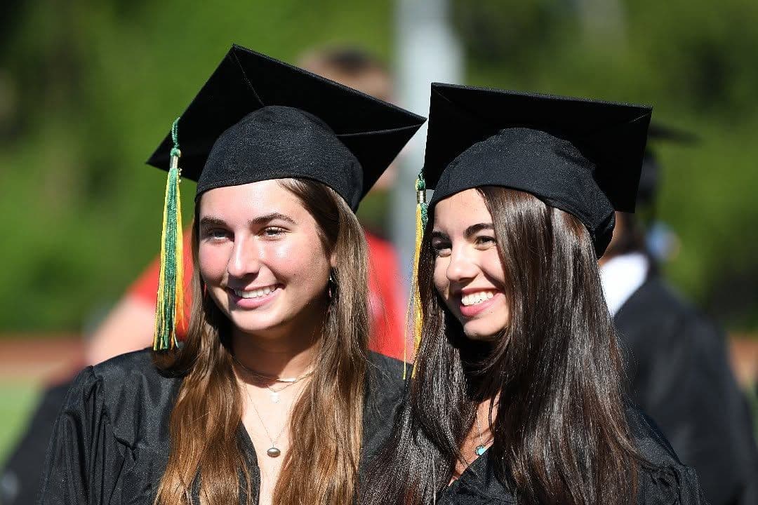 Grads pose for a photo