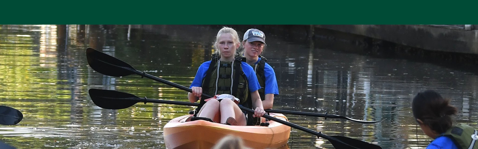 Students in kayaks