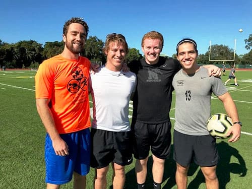 Four alumni on the field