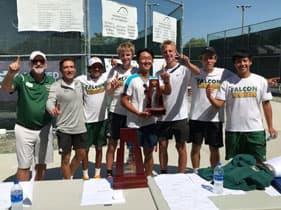 Tennis team holding trophy